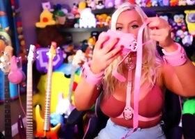 A super sexy blonde with big boobs and masturbating with a v